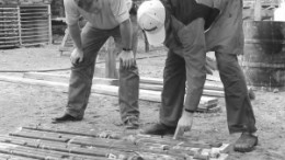 Brian MacEachen (left), Linear Metals' president, and Matt Rees, chief geologist, examine drill core from the KM61 copper-moly-silver project in northwestern Ontario.
