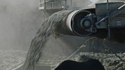 Material flies off a conveyor at Anaconda Mining’s Pine Cove gold mine Newfoundland. Credit: Anaconda Mining.