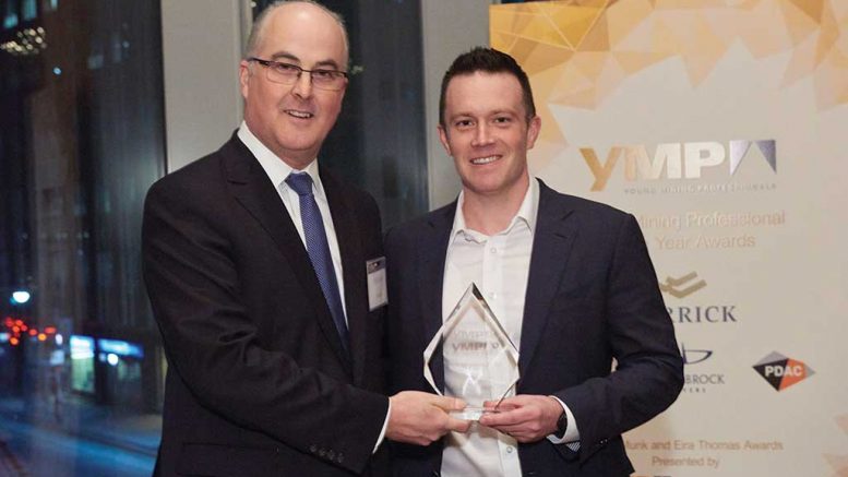 Peter Sinclair (left), chief sustainability officer at Barrick Gold, presents Nolan Watson, president and CEO of Sandstorm Gold, with the Young Mining Professionals’ Peter Munk Award for 2016. Credit: YMP.