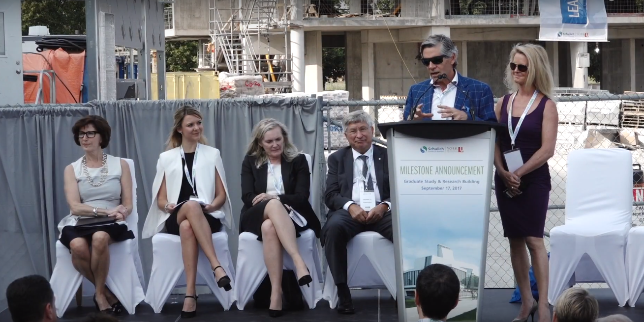 Rob McEwen speaking from the podium in 2017 during the unveiling ceremony of the Rob and Cheryl McEwen Graduate Study & Research Building, as part of the overall Schulich School of Business complex in Toronto. The naming followed Rob and Cheryl McEwen’s $8-million gift to the Leading Change campaign – one of the largest gifts received by the Schulich School of Business. Credit: Schulich School of Business.